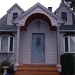 A nice porch enhances the entrance to this home.