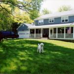 A covered front porch fits in with the design of this home.